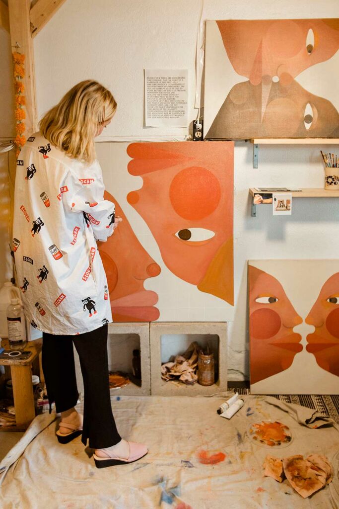 Laurie Nasica painting in her studio